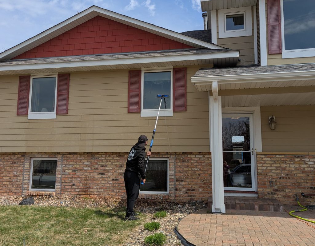 Close-up of spotless glass after window washing service by Orca Services and Window Washing